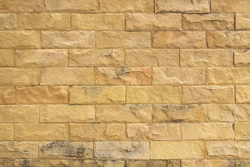 Sandstone yellow wall texture for background.