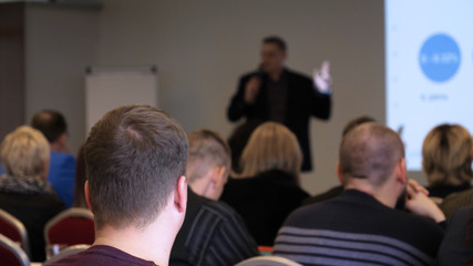 Blur of business Conference and Presentation in the blurred background of event concert lighting at conference hall.