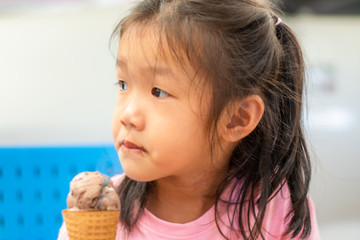 Kindergarten Asian girls eating ice cream