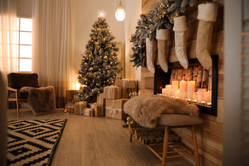 Stylish room interior with beautiful Christmas tree and decorative fireplace - Powered by Adobe