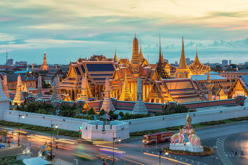 Wat Phra Kaew or Temple of the Emerald Buddhath and The Grand Palace at sunset in Bangkok Thailand. Wat Pra Kaew is a Buddhist temple, Wat Pra Kaew is among the best known of Thailand's landmarks.