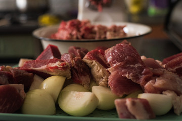 Mincer makes minced beef, pork and onions. Cooking homemade meat food