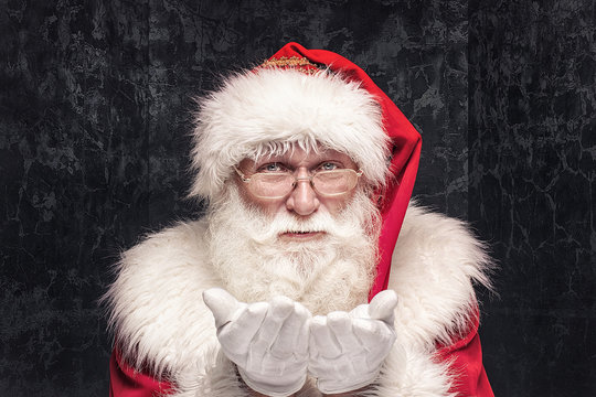 Portrait of real Santa Claus with white beard.