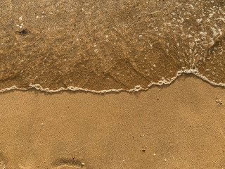 surf sea foam on perfect sand, travel copyspace background