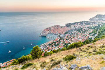 Fototapeta na wymiar Dubrovnik, Croatia - July, 2019: Sunset in Dubrovnik. Panoramic view