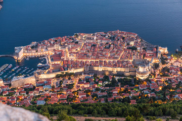 Fototapeta na wymiar Dubrovnik, Croatia - July, 2019: The old town of Dubrovnik, Croatia on a sunny day from the top of the hill.