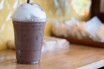 Iced coffee mocha in takeaway cup