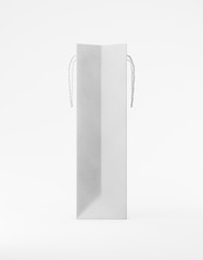 Eco packaging mockup bag kraft paper with handle side. Tall narrow white template on white background promotional advertising. 3D rendering