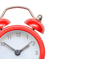 Red clock on white with copy space