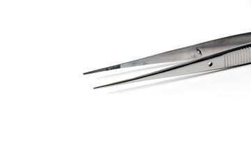 Pair of steel tweezers isolated on white