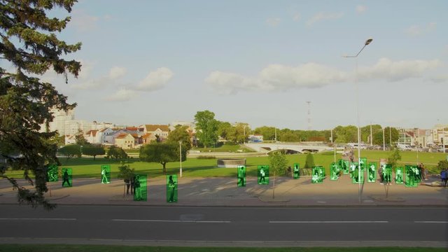 High view camera of people walking. Facial recognition interface scans personal data for each person