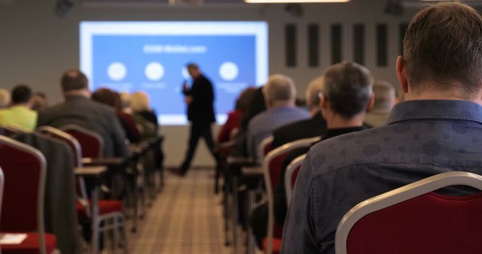Blur of business Conference and Presentation in the blurred background of event concert lighting at conference hall.