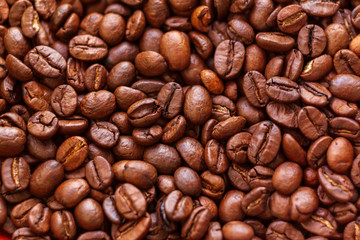 Roasted aromatic brown coffee beans background