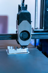 3D printer or additive manufacturing and robotic automation technology.