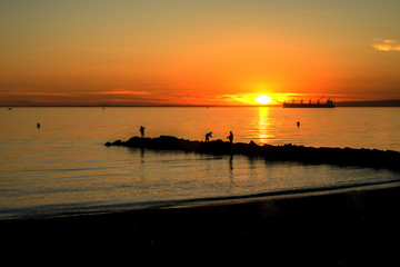 Sunset and fishermen