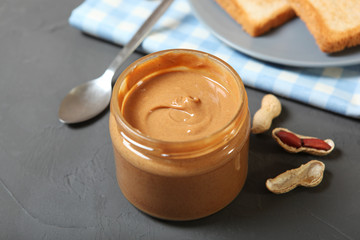 creamy peanut butter on the table. Peanut paste.
