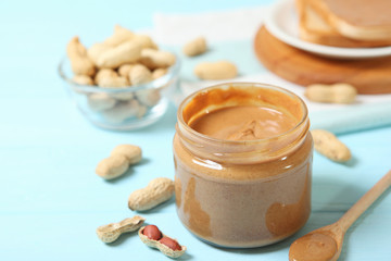 creamy peanut butter on the table. Peanut paste.