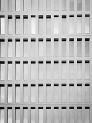 Urban concept. Facade of a building that repeats identical windows.