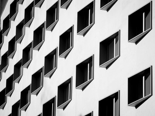 Urban concept. Facade of a building that repeats identical windows.