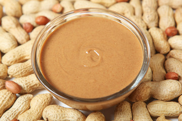 creamy peanut butter on the table. Peanut paste.