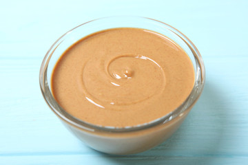creamy peanut butter on the table. Peanut paste.