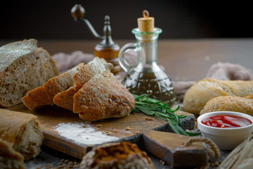 Bread products on the table in composition - close-up