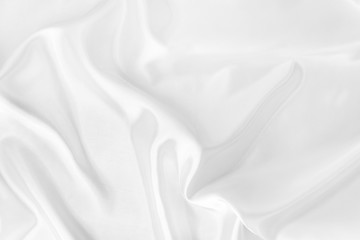 White gray fabric texture luxurious shiny that is abstract silver silk cloth background with patterns soft wave blur beautiful