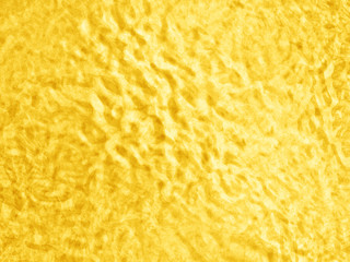 Gold foil background texture, luxury elegant Christmas paper design with abstract yellow metal color and shine in fancy rich background