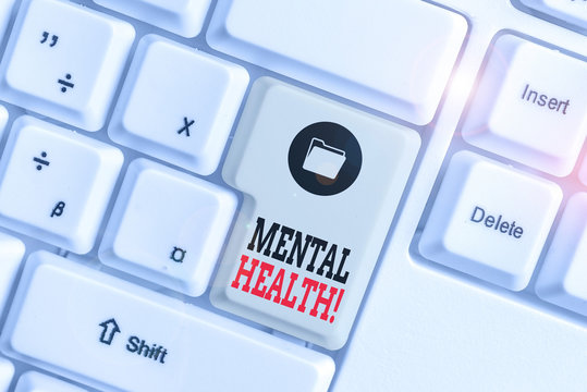 Text sign showing Mental Health. Business photo showcasing demonstratings condition regard to their psychological well being White pc keyboard with empty note paper above white background key copy