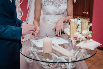 Obraz na płótnie Canvas wedding,wedding decoration,groom, bride,flowers,wedding rings,the wedding cake,firework