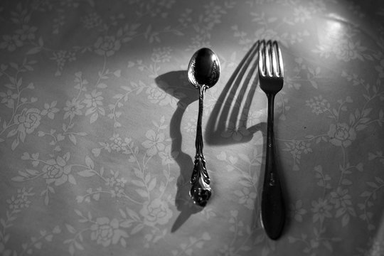spoon and fork on the kitchen table