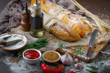 Bread products on the table in composition - close-up