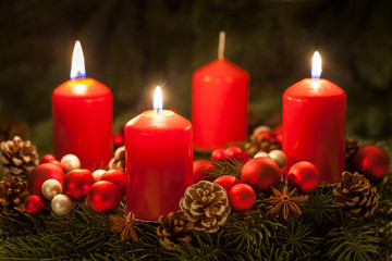 Advent wreath with candles on the third Sunday in Advent