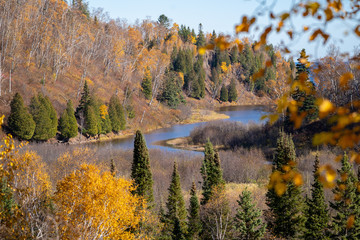 The Gooseberry River, a stream in Lake County Minnesota in the fall, leads into Gooseberry Falls waterfall State Park