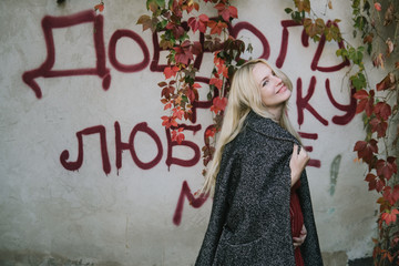 young beautiful pregnant woman in a red dress