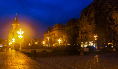Fototapeta na wymiar Victoriei Square with Orthodox Cathedral at night, Timisoara