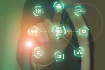 Writing note showing New Trends 2019. Business concept for general direction in which something is developing Picture photo system network scheme modern smart device