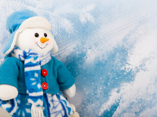 snowman on winter background with copy space