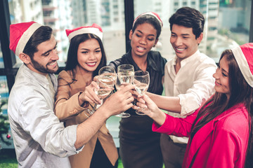 Group of office workers celebrating party with drink wine with happy.