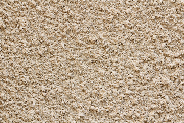 Concrete wall texture background. Natural stones. Building's facade decor.  Decorative plaster. House exterior.