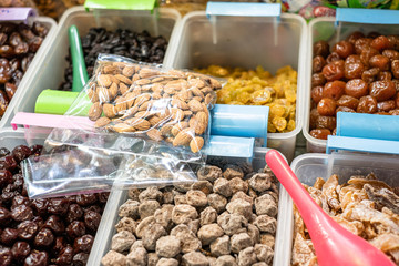 Variety of dried fruit food at local market in Thailand