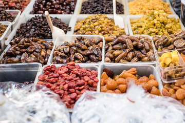 Variety of dried fruit food at local market in Thailand