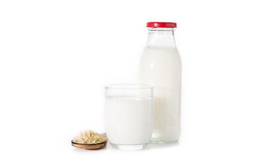 Rice milk in glass isolated on white background.