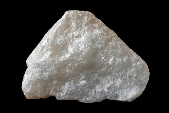 White talc mineral from Spain isolated on a pure black background.