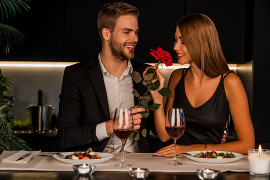 Young Man And Woman Having Romantic Dinner