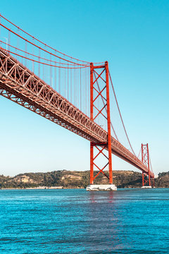 Red bridge, Lisbon, Portugal. Ponte 25 de Abril Suspension Bridge over the Tagus river.