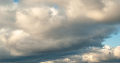 Cumulus clouds over the earth in late autumn