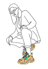 Young woman in sneakers