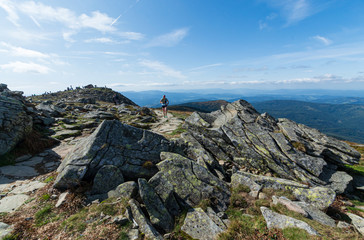girl athlete on top of the mountain.