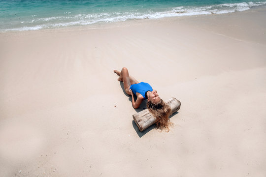 Photo from above of a young chicky girl with blond hair and great slim body